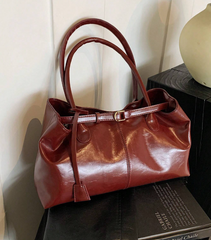 Hand-Held Belt Buckle Tote Bag